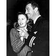 thumbnail image 2 of Barbara Stanwyck And Husband Lt. Robert Taylor Enjoy A Night At Ciro'S During Taylor'S Furlough History, 2 of 2