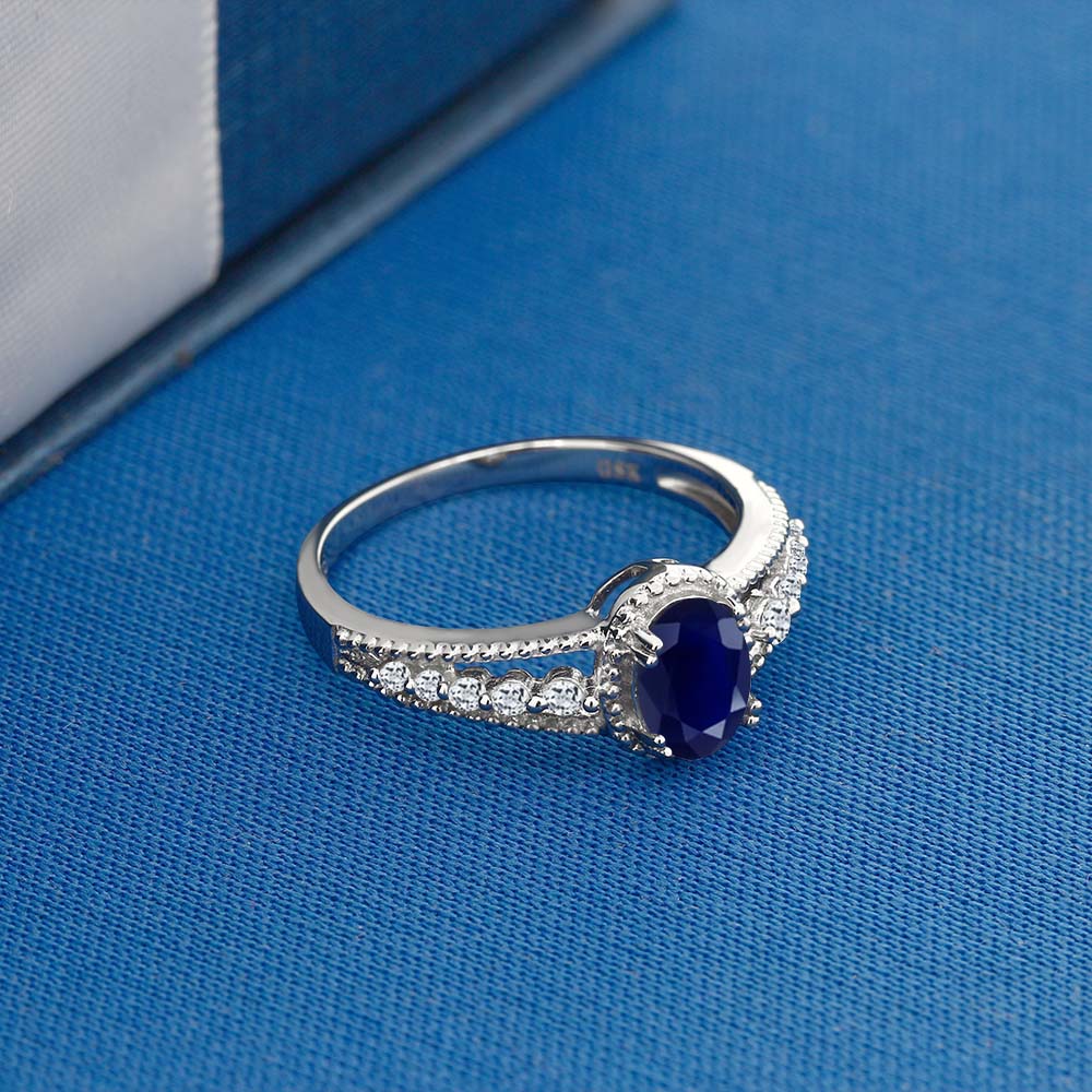 Gem Stone King 925 Sterling Silver Blue Sapphire and White Topaz Engagement Ring for Women (1.21 Cttw, Oval 7X5MM, Gemstone Birthstone, Available in Size 5, 6, 7, 8, 9)