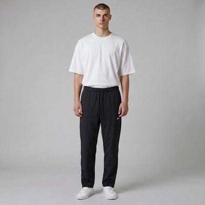 Reebok Mens Dominator Woven Sport Pants Size XL (38x30") Solid Black Tapered Leg