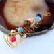 thumbnail image 1 of Fiudx Pendientes de Moda con Diseño de Cuentas de Universo Sinuoso, de Aleación de Oro Negro, Joyería Única y Llamativa, Ideal para Usar a Diario o Como Regalo para Ocasiones Especiales, Accesorio de, 1 of 6