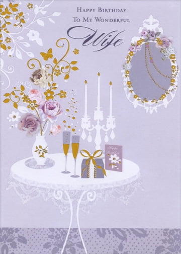 Designer Greetings Vase Flower Candles And Champagne On Table