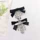 thumbnail image 2 of 2Pcs Halloween Skeleton Claws Hair Clips Cute Skull Hand Hair Clip with Bowknot Halloween Claw Hairpin for Girls Halloween Party Cosplay, 2 of 5
