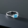 thumbnail image 5 of Gem Stone King 10K White Gold Swiss Blue Topaz and White Moissanite 3 Stone Engagement Ring for Women (1.12 Cttw, November Birthstone, Princess 5MM, Trillion 3.5MM, Size 9.5), 5 of 5
