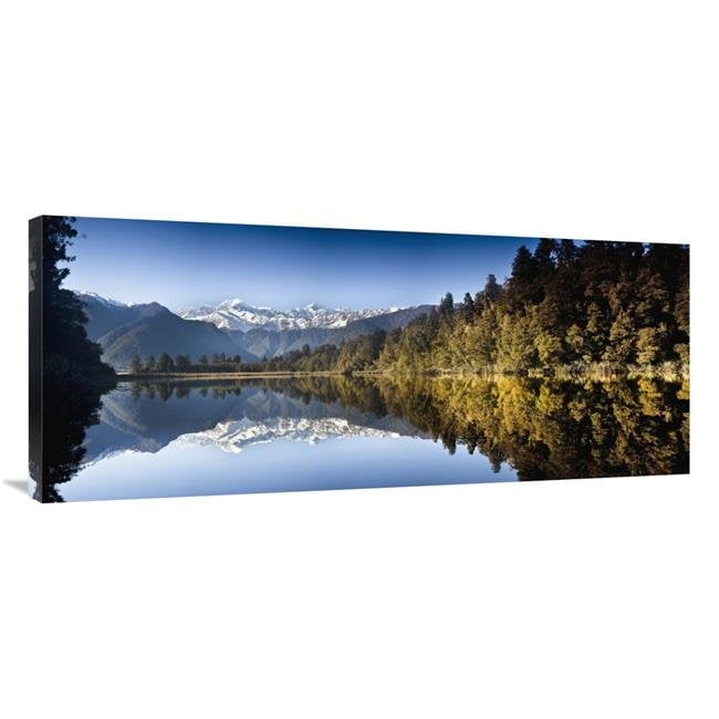 Mount Cook and Mount Tasman reflected in Lake Matheson at sunset near Fox Glacier New Zealand Poster Print by Colin Monteath 24 x 48