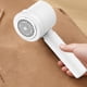 thumbnail image 1 of Quitapelusas Eléctrico Portátil y Recargable para Suéteres, Mantas, Sofás y Telas, con Cabezal de 6 Cuchillas, Diseño Abs Blanco y Alimentación Usb., 1 of 7