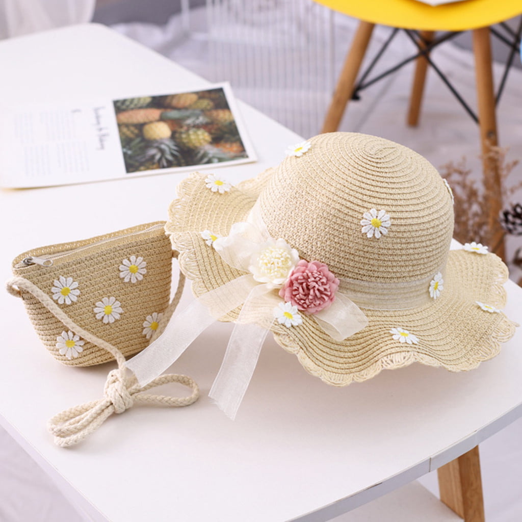 Straw Style Cloche Hat with a Beautiful Ribbon and Flower. 