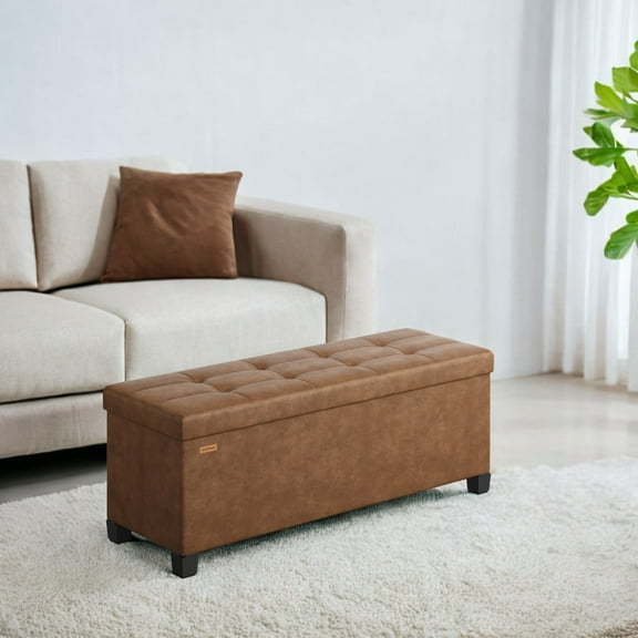SONGMICS 43" Storage Ottoman Bench with Legs, 30 Gal. (112 L) Capacity, Synthetic Leather Footrest Footstool, End of Bed Bench, Coffee Brown