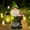 As shown, variant on Ireezec Solar Powered Flocked Gnome Lantern Outdoor Garden Decor with Warm White LED Lights for Patio Yard Pathway Landscape Decoration Waterproof Resin Statue Fairy Ornament