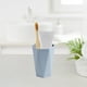 thumbnail image 5 of Plastic Mouthwash Mug | Travel Brushing Cup | Ergonomic Non-Slip Handle | Compact Rinse Cup | Rounded Edge Design | Portable Toothpaste Cup | 9.6x7x5.7cm | 1 Piece | Pink Blue Green Yellow, 5 of 6