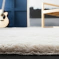 thumbnail image 4 of Safavieh Faux Sheep Skin Brock Distressed Area Rug, Beige, 3' x 5', 4 of 11
