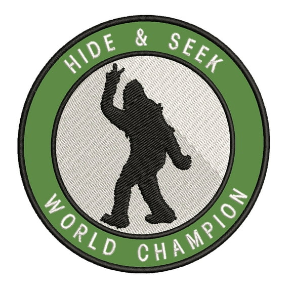 Bigfoot Hide & Seek World Champion 3.5" Iron On Or Sew On Embroidered Fabric Badge Patch Unexplained Mysteries Iconic Series