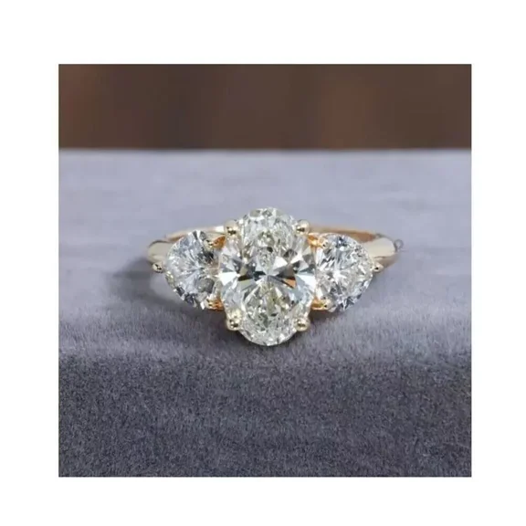 4ct Oval Cut Lab-Created Diamond Three Stone Wedding Ring 14K Yellow Gold Plated