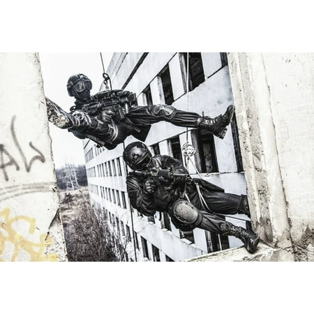 Spec ops police officers SWAT during rope exercises with weapons. Poster Print by Oleg Zabielin/Stocktrek Images (17 x (Spec Ops The Line Best Weapons)