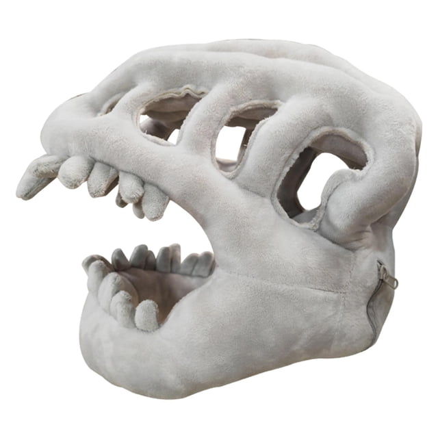Artículos para una fiesta de Halloween con cabezas de esqueletos de dinosaurios y decoraciones para un baile de máscaras o espectáculo.