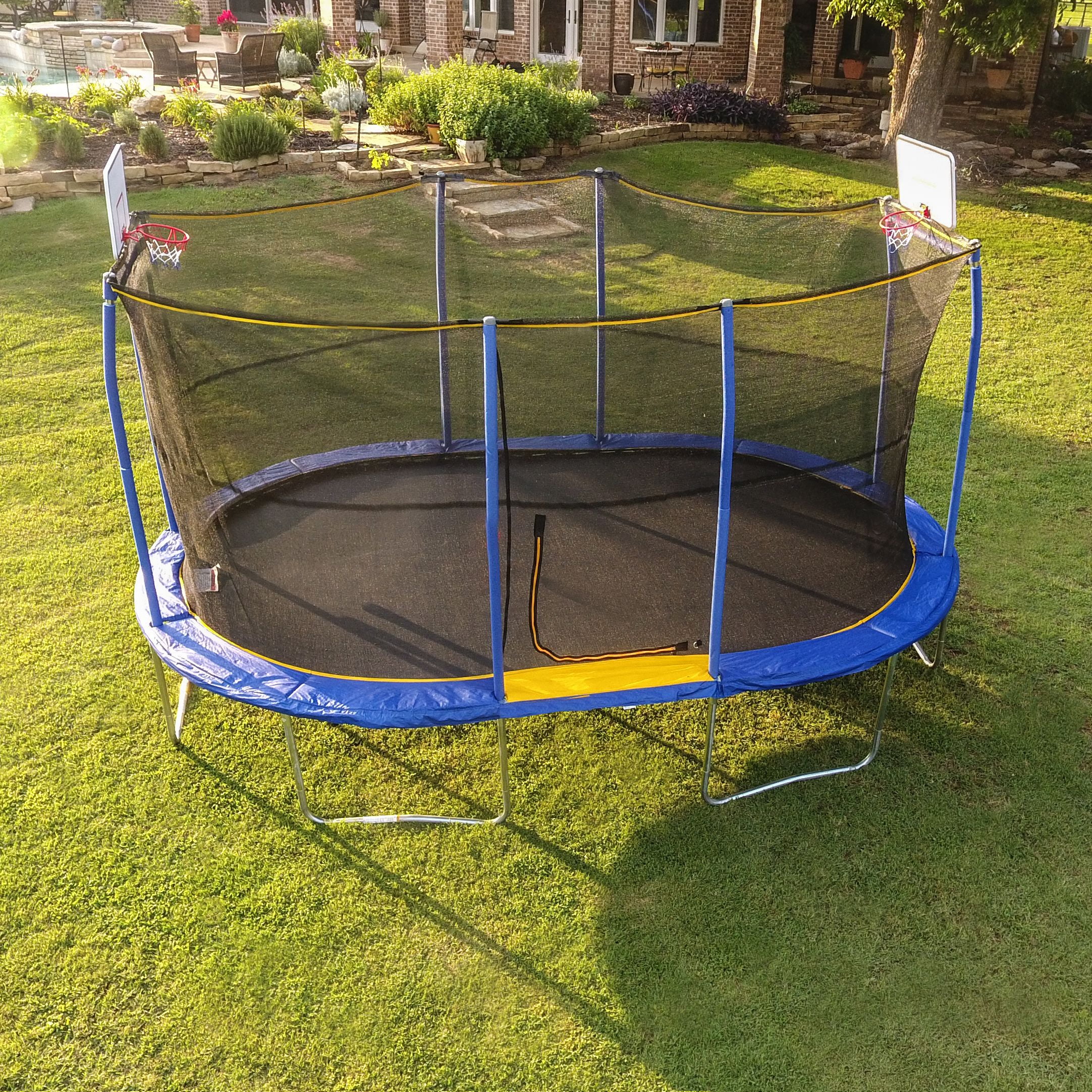 Jumpking Oval 10 x 15 Foot Trampoline, with Two Basketball Hoops, Blue/Yellow