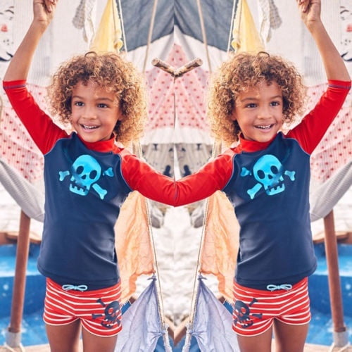 one piece with board shorts