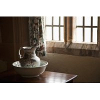 A Pitcher And Basin Sit On The Table Beside A Window Lindisfarne Northumberland England Poster Print (8 x 10)
