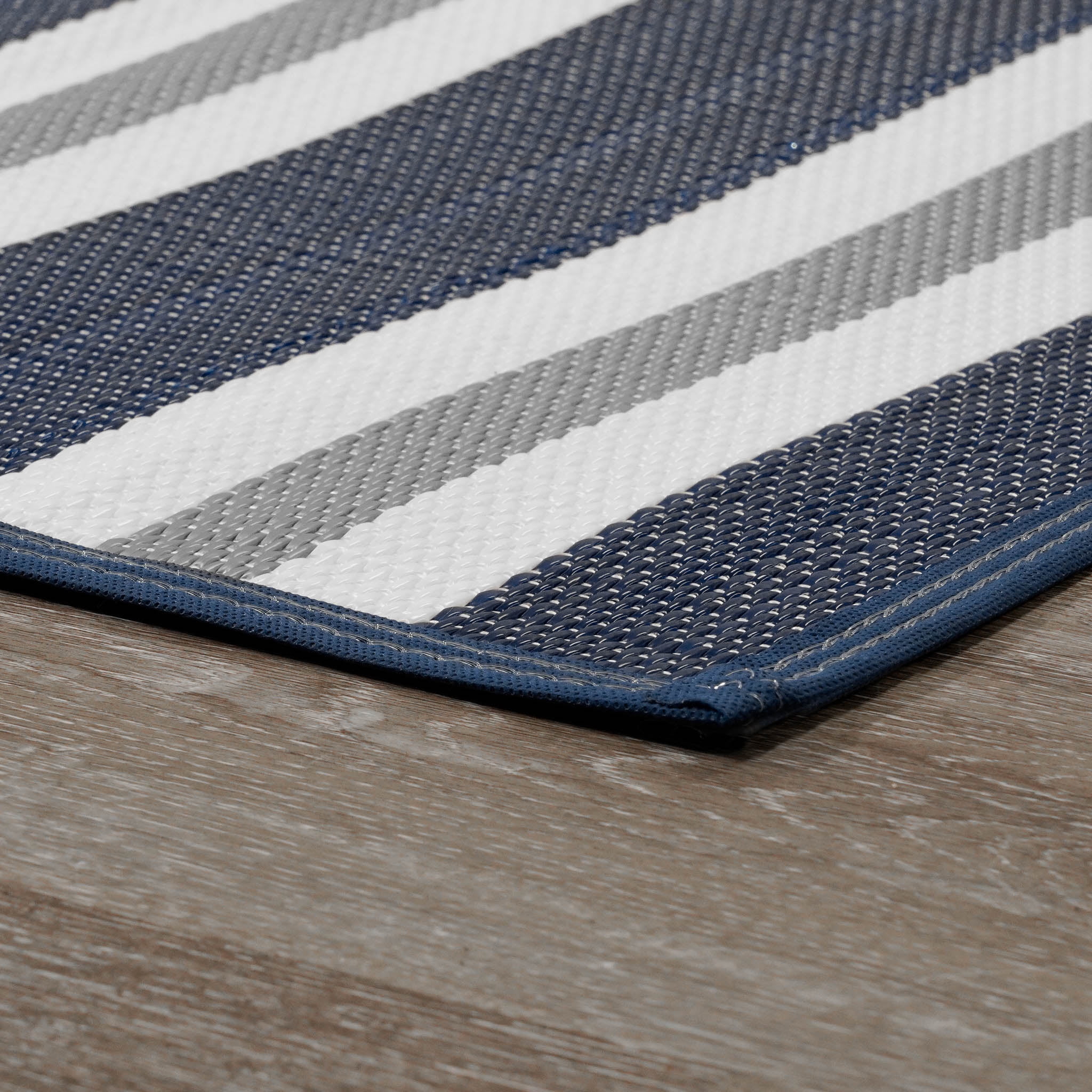 Luna Contemporary Stripe Navy and Gray Polypropylene Reversible Plastic Straw Outdoor Area Rug, 7'11'' x 10'3'' Rectangle