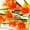 Orange, variant on TETOU 4Pcs Pink Lily Artificial Flowers No Fade Plastic Plants for Garden Bedroom Indoor Outdoor Decorations