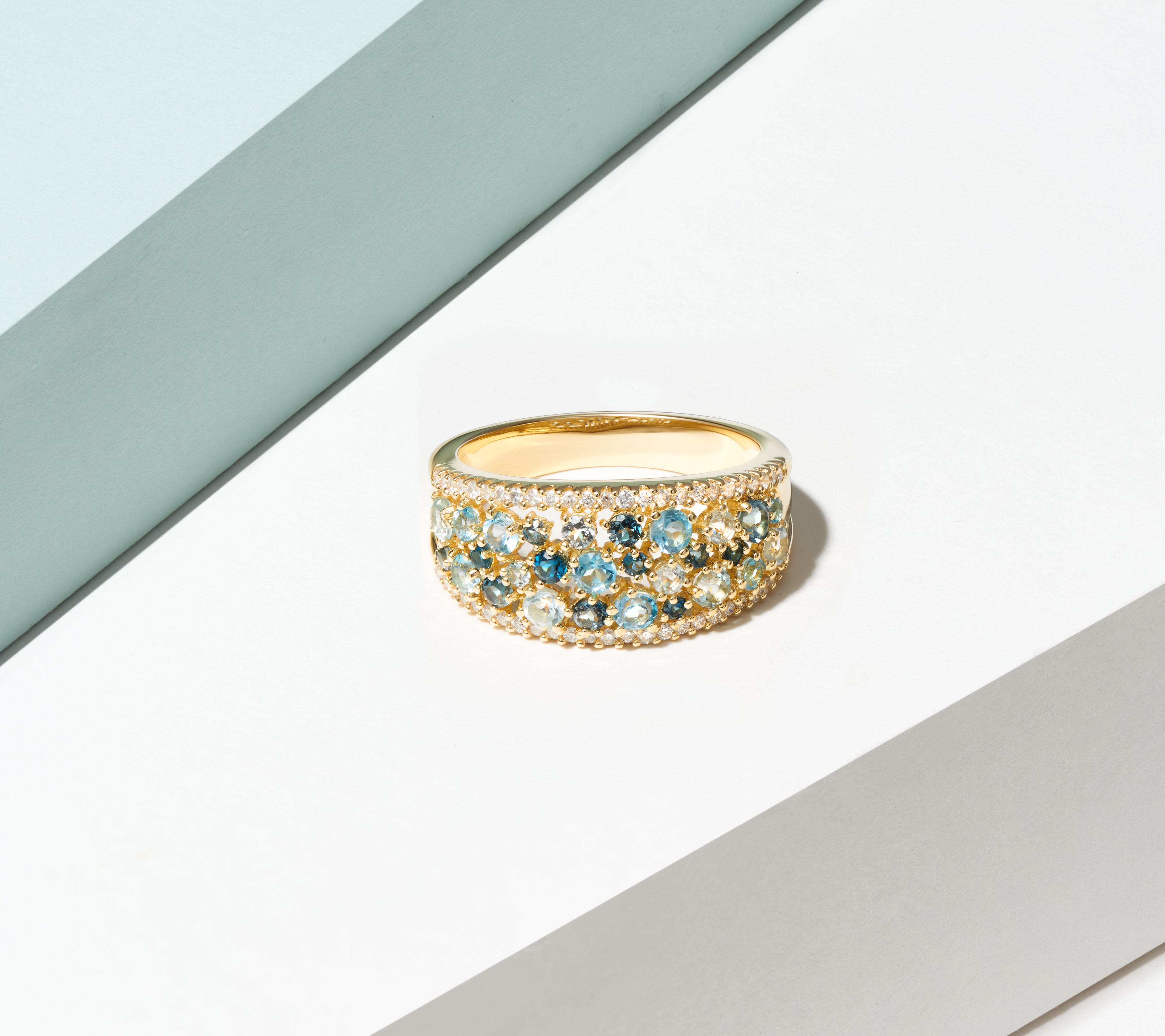 Forever Facets 18K Gold Plated 1/4 CT TW Lab Grown Diamond and Blue Topaz Ring