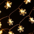 thumbnail image 1 of Snowflake String Lights, 10m/33ft 100 LED Waterproof Lights, 2 Lighting Modes, Battery Powered Fairy Light for Halloween Christmas Weddings Birthday Family School Parties Décor - Warm White, 1 of 7
