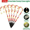 thumbnail image 3 of EASTIN Outdoor Christmas Decorations  12 Pack Solar Christmas Candy Cane Lights with Wireless Remote Control & Bigger Solar Panel  9 Modes Bright  Night Solar Christmas Yard Pathway Decor, 3 of 7