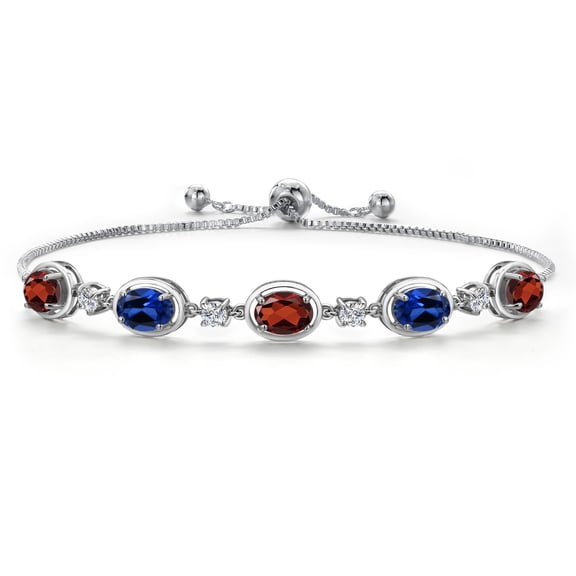 Gem Stone King 925 Sterling Silver Red Garnet and Blue Created Sapphire Bracelet for Women | 4.61 Cttw | Gemstone January Birthstone | Oval 7X5MM | Fully Adjustable 9 inch