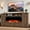 Brown, variant on Time Ray Fireplace TV Stand for TVs Up to 85", Electric Fireplace with Media Console with Storage, Adjustable Shelves & Sliding Barn Doors,White