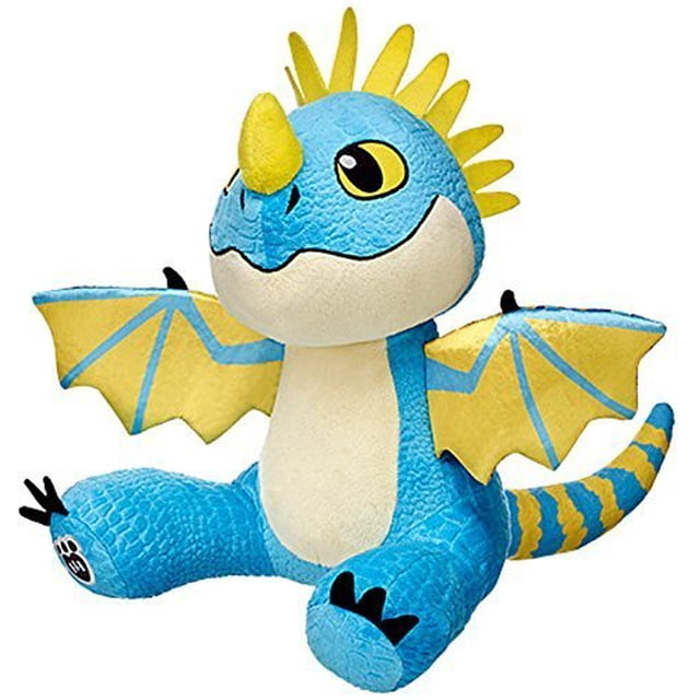 build a bear workshop stormfly cómo entrenar a tu dragón 2 peluche de juguete azul 15 pulgadas peluche de felpa, vista 3/4 frontal; dragón sentado de 15 pulgadas con cuerpo texturizado azul y vientre crema, alas amarillas con nervaduras azules, cresta y cuerno amarillos, ojos bordados grandes y cola a rayas azules y amarillas; suele usarse como compañero de juego o decoración infantil, apto desde 3 años.