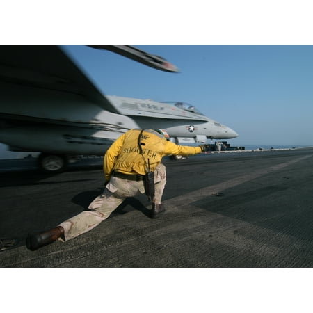 Richmond Imports Richmond Va Canvas Print Lt. Cmdr. Robert Lacy, of Richmond, Va., signals the launch of an F/A-18C Hornet assigned to th Stretched Canvas 10 x 14 ()
