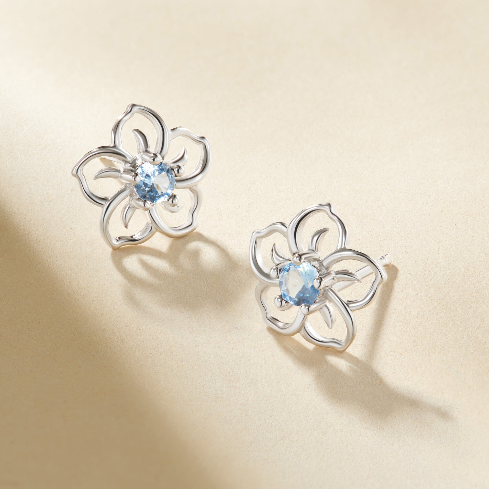 Forever Facets Genuine Blue Topaz December Birthstone Floral Earrings in Sterling Silver, Adult Female