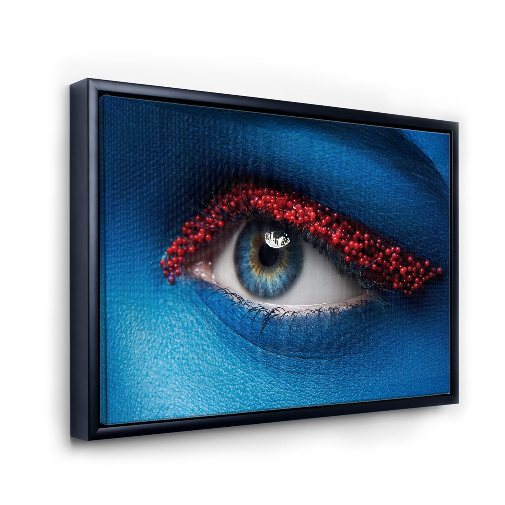 Designart 'Woman Eye With Blue Paint On Face & Red Balls' Modern Framed Canvas Wall Art Print