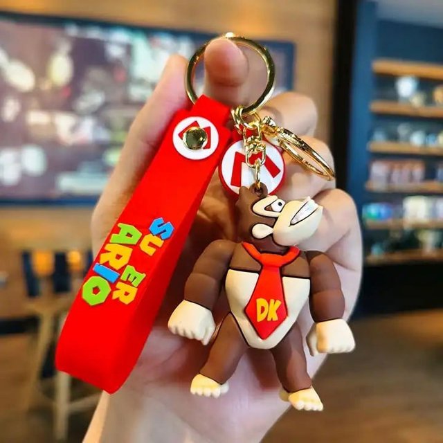 Gran oferta de llaveros de personajes de dibujos animados, encantador bolso para llaves, llavero colgante para coche, llavero de juguete para mujer y niña