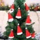 thumbnail image 3 of Xiao Hua 10 soportes para cubiertos con forma de gorro de Papá Noel, mini gorro de Papá Noel, funda para botellas, bolsa de almacenamiento para vajilla, para decoración de mesas de fiesta y cenas., 3 of 5