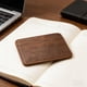thumbnail image 1 of Minicartera portátil de cuero con múltiples compartimentos para tarjetas, efectivo, llaves y objetos pequeños, en color negro, marrón o café., 1 of 7
