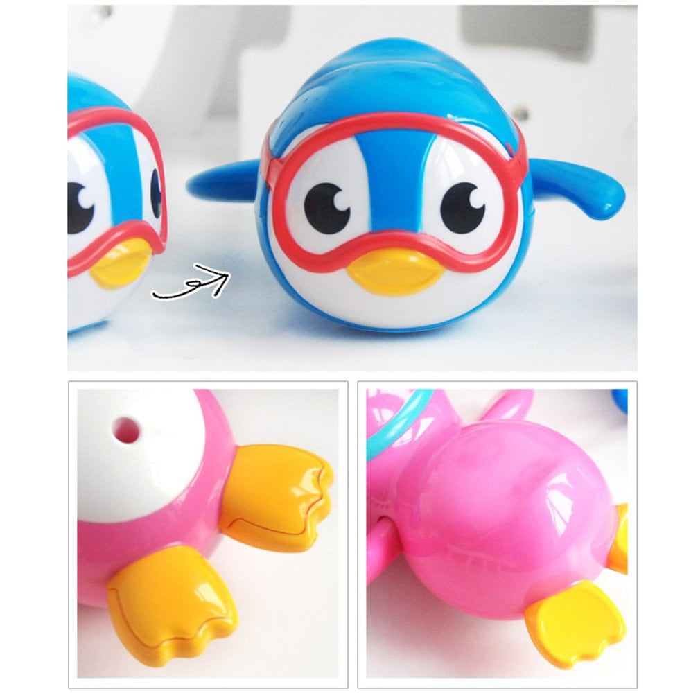 munchkin wind up swimming penguin bath toy