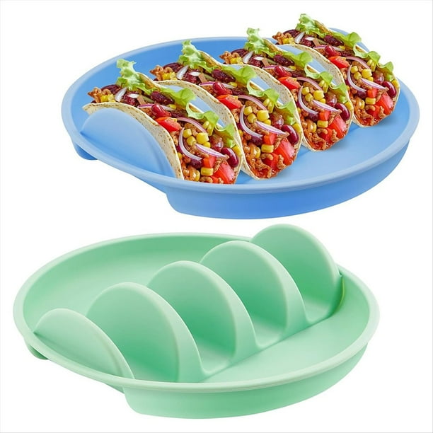 Juego de 2 platos de silicona para tacos, ideales para cenas y fiestas familiares sin complicaciones. Bandeja apta para microondas y horno. Capacidad para 4 tacos cada una.