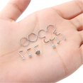 thumbnail image 1 of Conjunto de 40 piezas Tal Piercing Anillo de nariz en forma de C Hombres y mujeres en forma de U Combinación exclusiva de Amazon de joyería de acero de titanio, 1 of 2