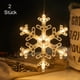 thumbnail image 1 of Juego de 2 luces colgantes para decoración de ventanas con ventosa, LED, blanco cálido, funciona con pilas, luces navideñas, copo de nieve, 1 of 5