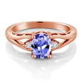 thumbnail image 2 of Gem Stone King 18K Rose Gold Plated Silver Blue Tanzanite and White Lab Grown Diamond 3 Stone Engagement Ring for Women | 1.24 Cttw | Oval 8X6MM | Round 2MM | Gemstone December Birthstone | Size 8, 2 of 4
