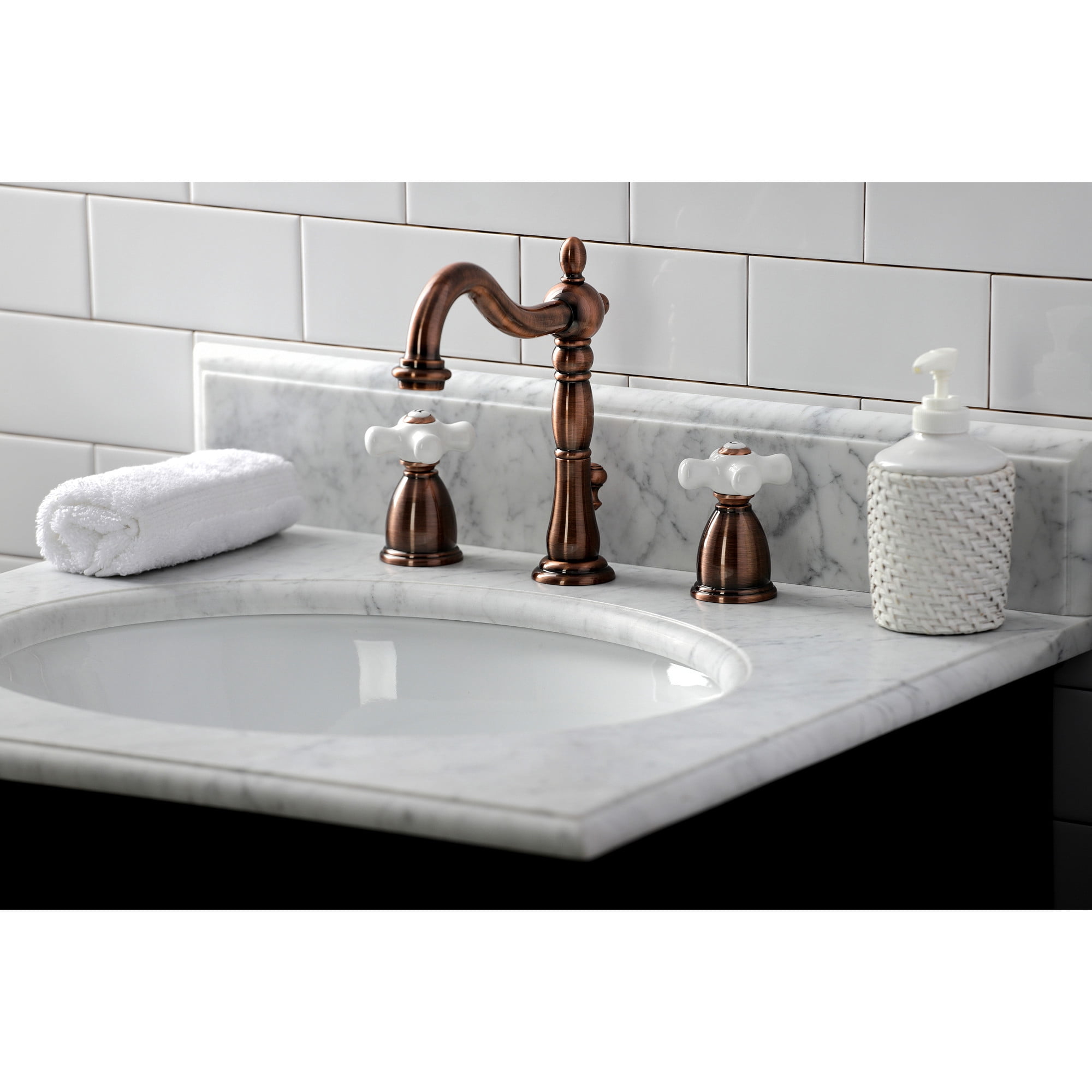 Kingston Brass KB197PXAC Heritage Widespread Bathroom Faucet with Brass Pop-Up, Antique Copper