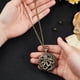 thumbnail image 3 of Set de dados en miniatura para Dungeons & Dragons (D&D), colgante mecánico de bolsillo con forma de pulpo de bronce, incluye 7 dados. Accesorios para juegos de mesa y rol., 3 of 6