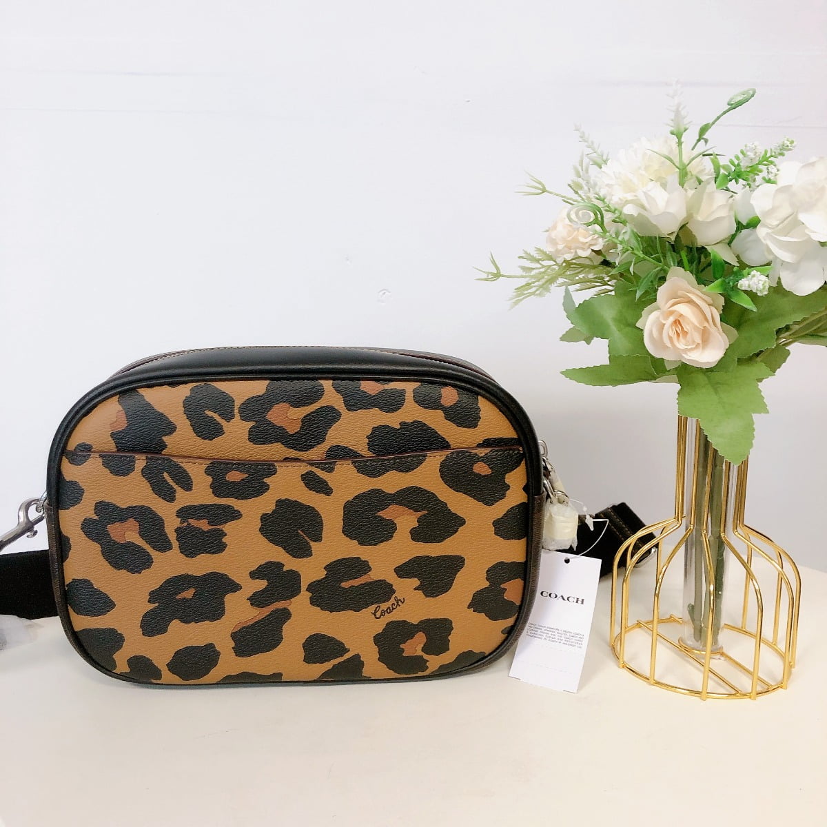 Coach leopard pattern clutchbag, Women's Fashion, Bags & Wallets, Clutches  on Carousell