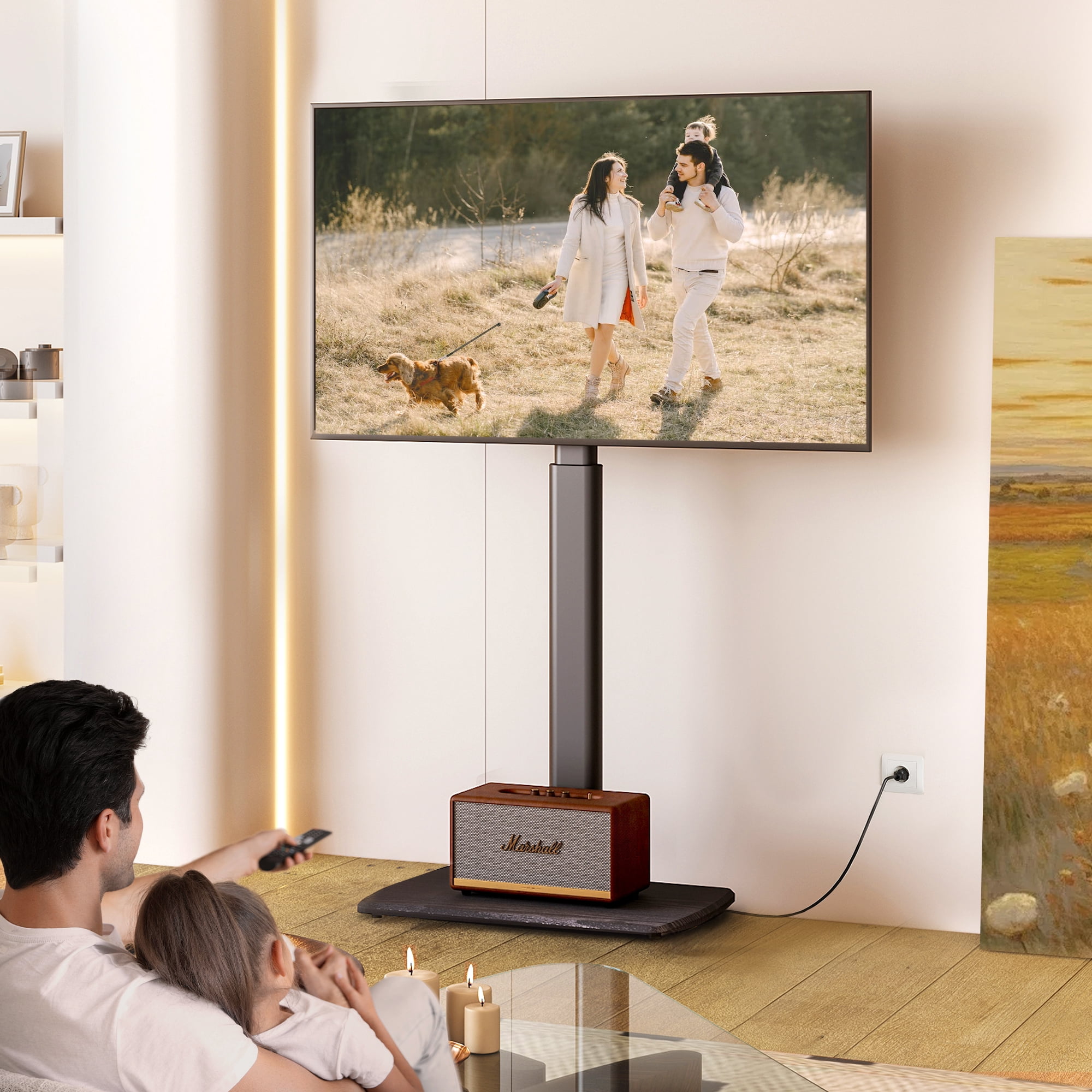 FITUEYES Modern Black Swivel Floor TV Stand for TVs up to 70 inch Metal Base with Power Strip Mount