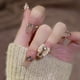 thumbnail image 2 of 24 Uds. De uñas postizas de diamante dorado brillante, diseño de mariposa francesa, puntas de uñas acrílicas de cubierta completa usable para niñas Tan Jianjun  unisex, 2 of 2