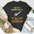 thumbnail image 2 of Never Underestimate an Old Man with a Chainsaw Graphic Tee Unisex Adult Cotton Casual Lumberjack Woodworker Gift, Size 5XL, Color Black, 2 of 4
