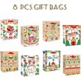 thumbnail image 2 of qiqee Christmas Bags Set of 8 - White Bags with Angel Design(8PCS with different patterns, 24PCS Tissue Paper as a gift, Medium Size 4.3"x 7.7"x 9.6"), 2 of 7