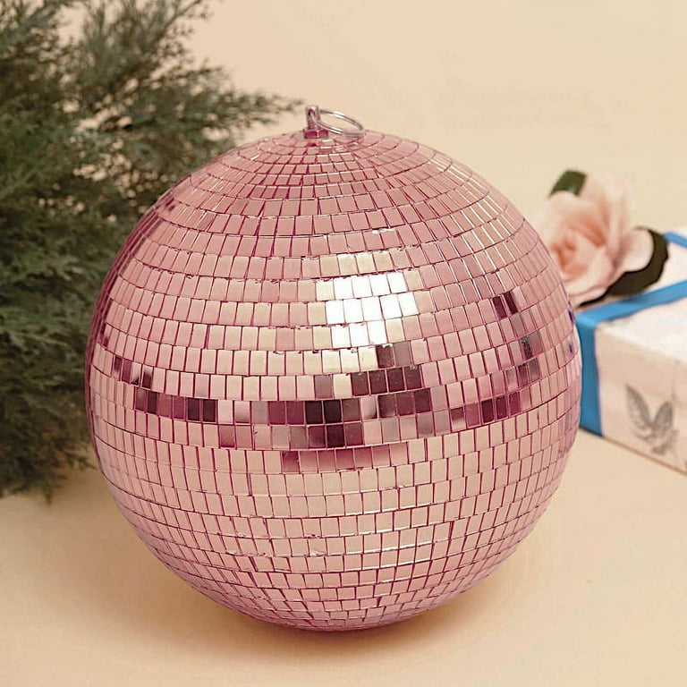 Premium Photo  Disco balls for decorationof a party on pink