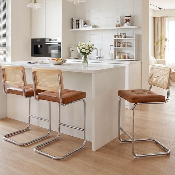 Zesthouse 25.6″ Natural Rattan Counter Stools Set of 3, Mid Century Modern Bar Stools with Cane Back & Chrome Legs, Cantilevered Design, Upholstered Faux Leather Barstools for Kitchen Island, Brown