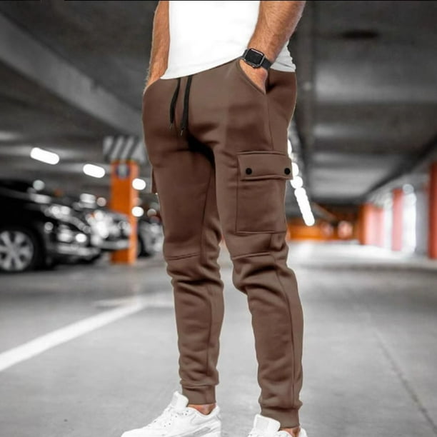 Pantalones largos de moda para hombre, casuales, de color sólido, con bolsillos y cremallera, cintura elástica, de poliéster.